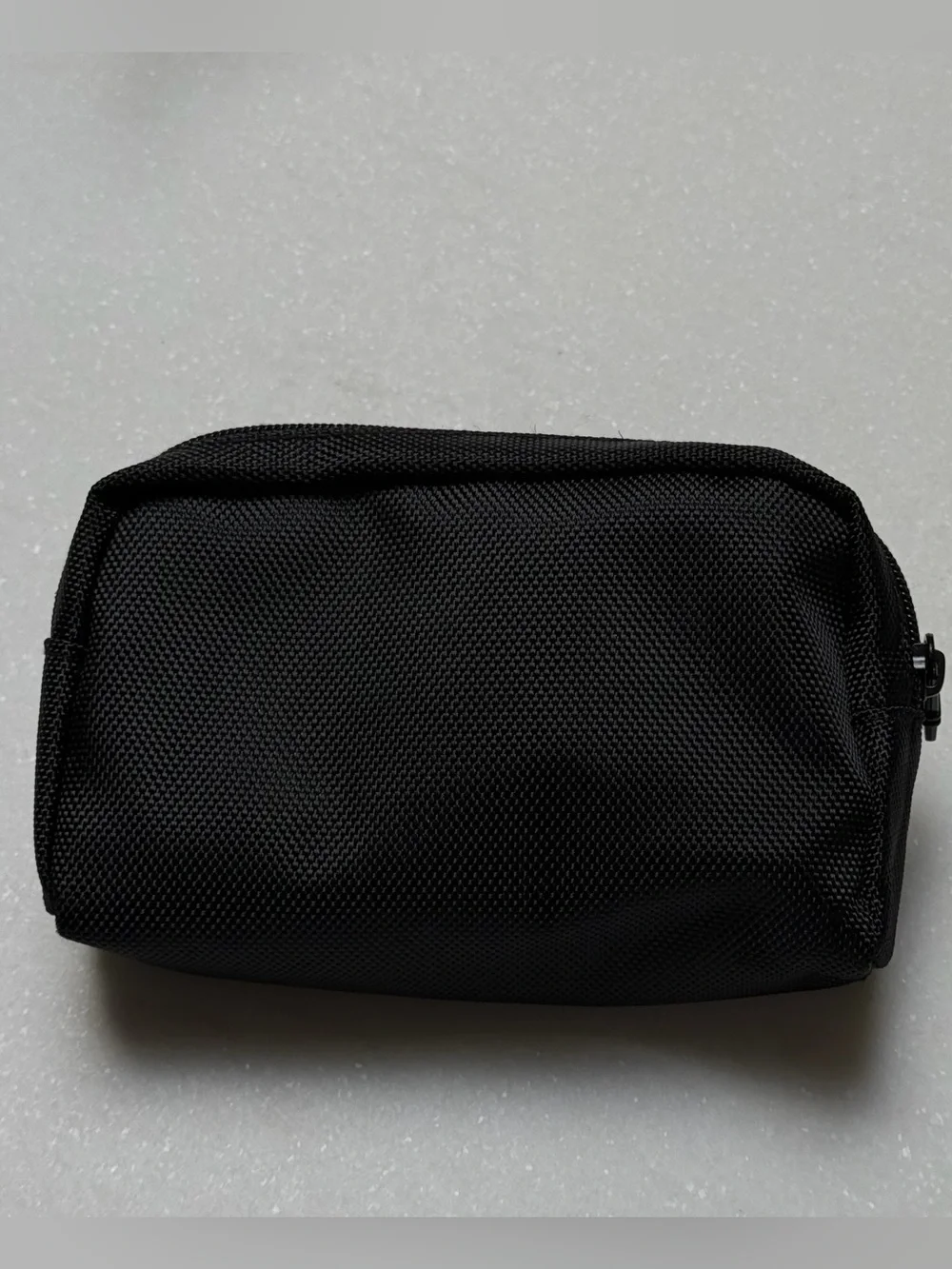 Tumi x Delta black zippered toiletry bag